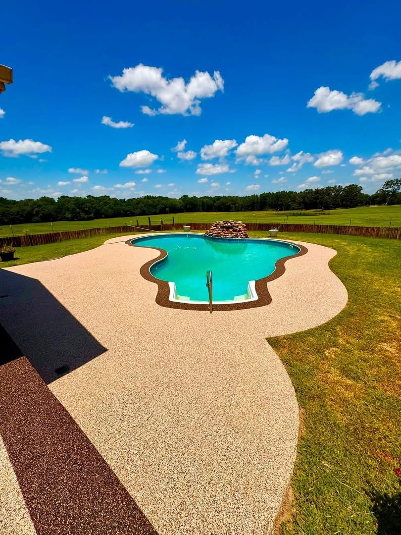 Same freeform pool deck finished in tan speckled Pro-Flex surfacing
