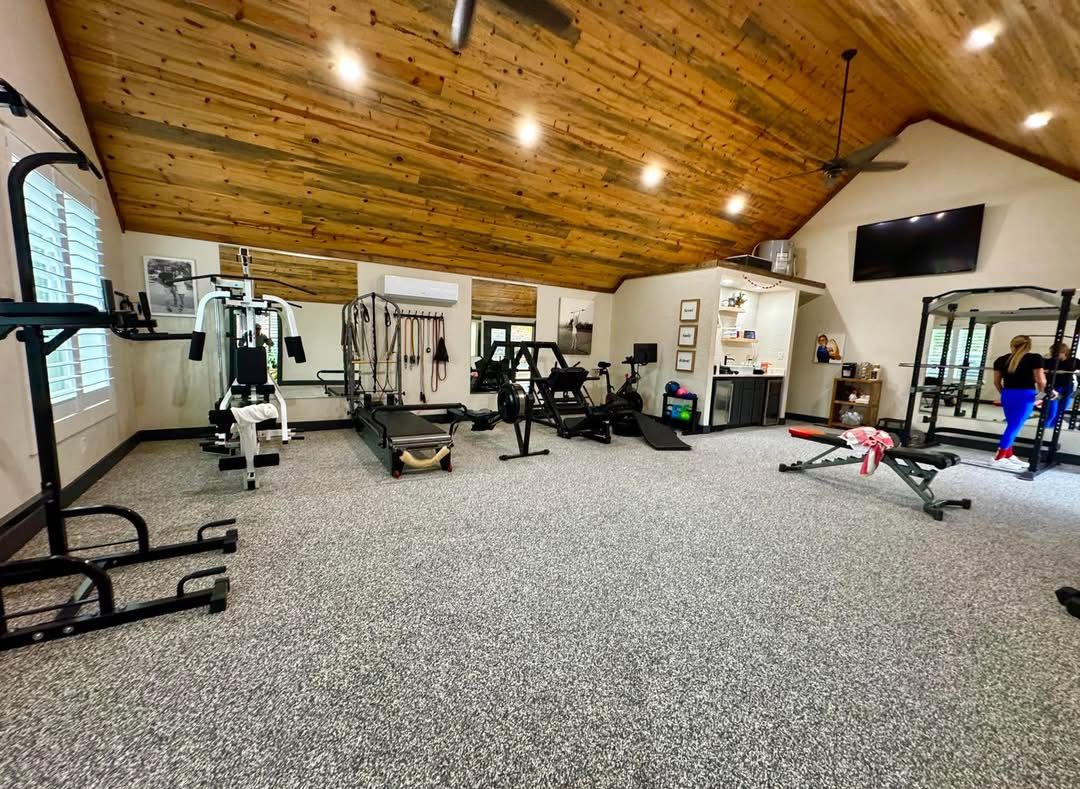 Flake floor coating installed in a home gym and shop space