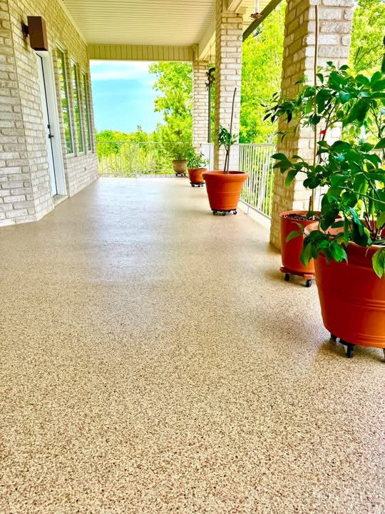 Long covered breezeway finished with a tan speckled flake floor coating