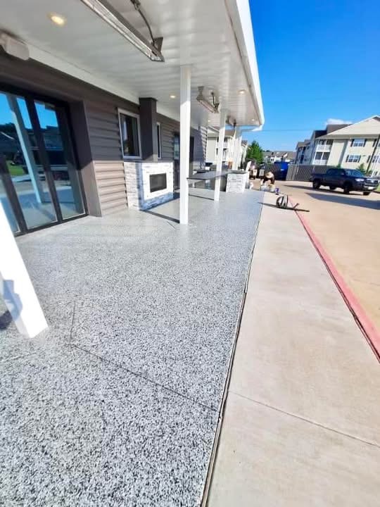 Modern outdoor patio finished with a speckled flake floor coating