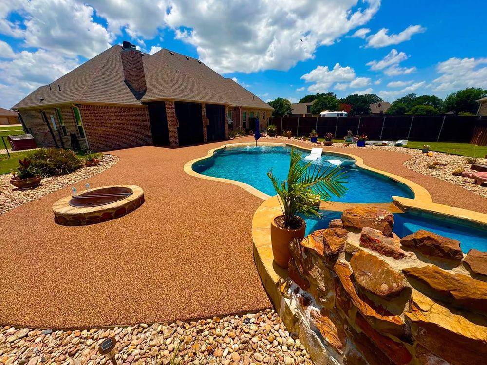 Backyard pool deck finished with Pro-Flex tan speckled surfacing